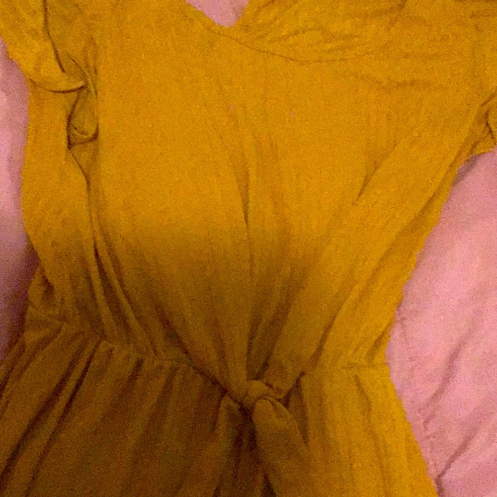 A yellow  or orange jumpsuit